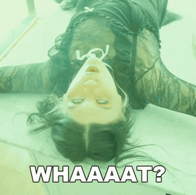 Woman Lying Down With Whaaat GIF