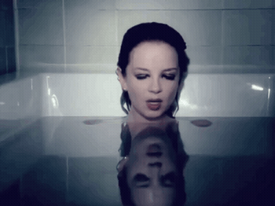 Woman Lying In Bathtub Reflection GIF