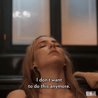 Woman Lying In Bathtub With Eyes Closed GIF