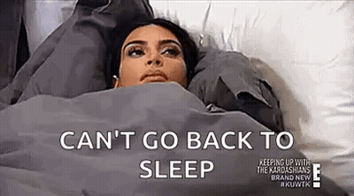 Woman Lying In Bed Can't Sleep GIF