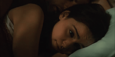 Woman Lying In Bed With Eyes Closed GIF