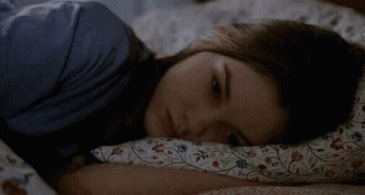 Woman Lying In Bed With Pillow GIF