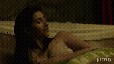 Woman Lying On Bed With Netflix GIF