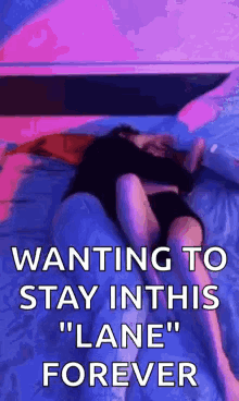 Woman Lying On Bed With Purple Light GIF