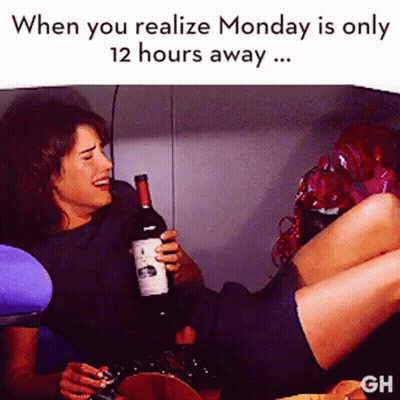Woman Lying On Bed With Wine GIF