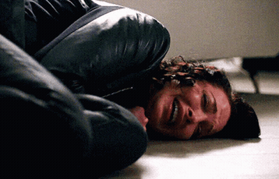 Woman Lying On Floor With Eyes Closed GIF