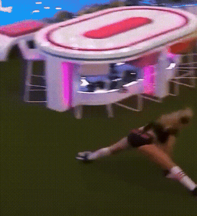 Woman Lying On Ground By Table With O GIF