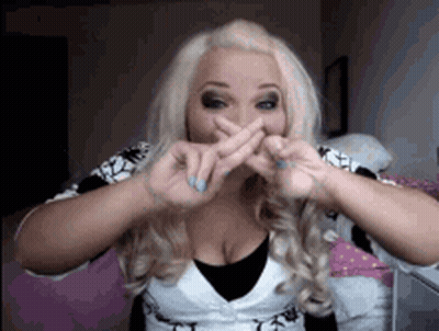 Woman Making Cross Sign GIF