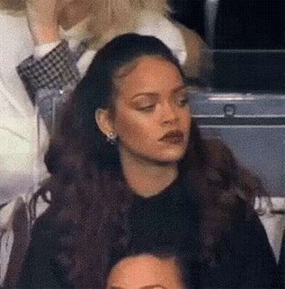 Woman Making Face In Crowd GIF