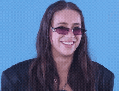 Woman Making Funny Face At Camera GIF