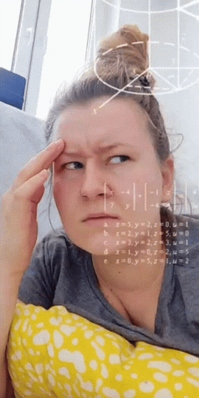 Woman Making Funny Face At Math Problem GIF
