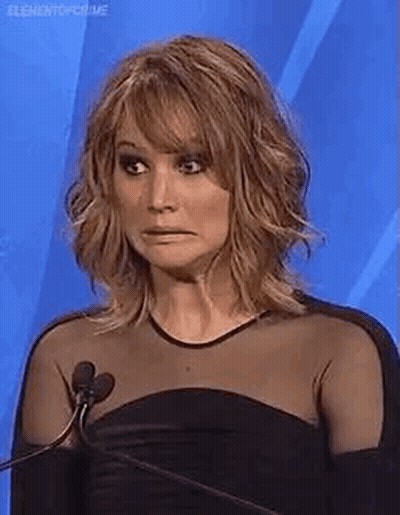 Woman Making Funny Face At Microphone GIF