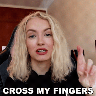 Woman Making Funny Face Cross My Fingers GIF