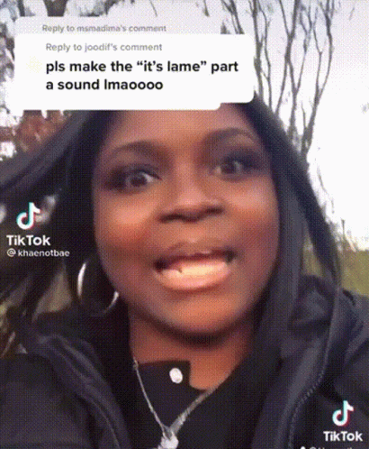Woman Making Funny Face In Black Jacket And Earrings GIF