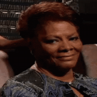 Woman Making Funny Face in Chair