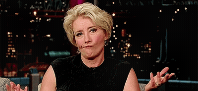 Woman Making Funny Face In Chair GIF