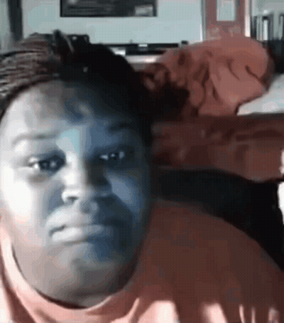 Woman Making Funny Face In Chair GIF