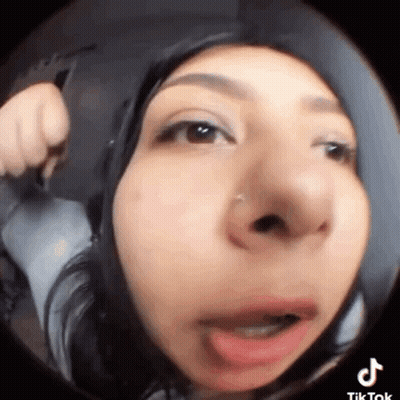 Woman Making Funny Face In Fisheye Lens GIF