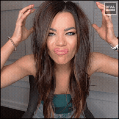 Woman Making Funny Face In Front Of Diva Studios Logo GIF