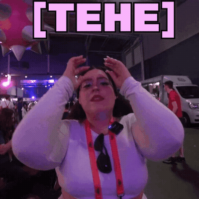 Woman Making Funny Face In Front Of Tehe Sign GIF