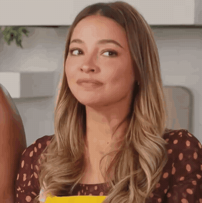 Woman Making Funny Face In Kitchen GIF