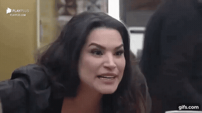 Woman Making Funny Face In Mirror GIF