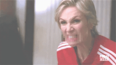Woman Making Funny Face In Red And White Striped Shirt GIF