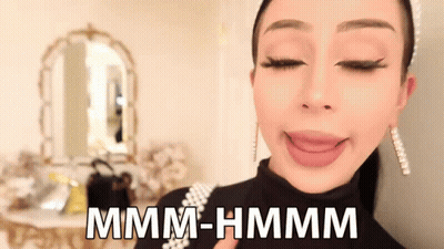 Woman Making Funny Face Mmmm Hmmm GIF