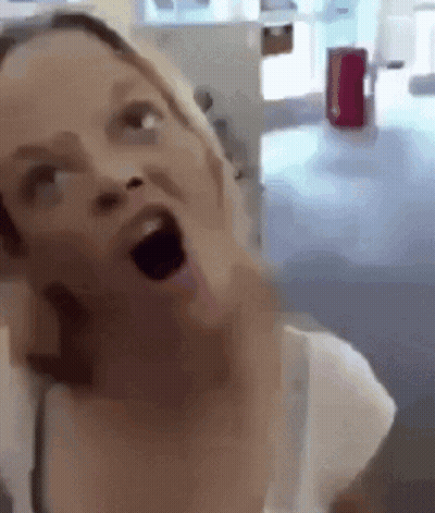 Woman Making Funny Face Mouth Wide Open GIF