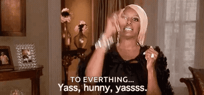 Woman Making Funny Face On Cell Phone GIF
