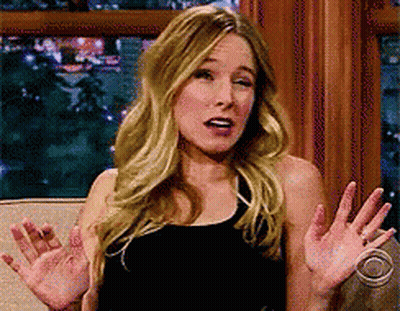 Woman Making Funny Face On Couch GIF