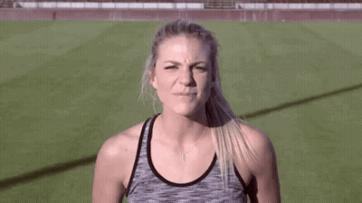 Woman Making Funny Face On Field GIF
