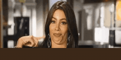Woman Making Funny Face Pointing GIF