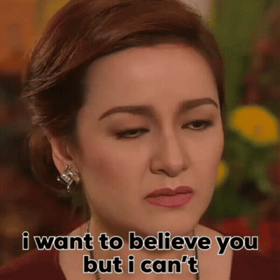 Woman Making Funny Face Saying I Want to Believe You But I Can't