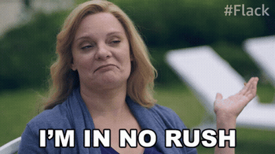 Woman Making Funny Face Saying No Rush GIF