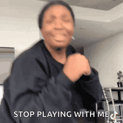 Woman Making Funny Face Saying Stop Playing With Me GIF