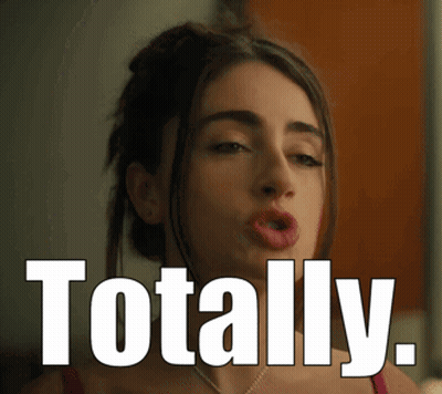 mujer haciendo mueca graciosa diciendo totally GIF