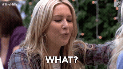 Woman Making Funny Face Saying What GIF