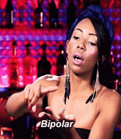 Woman Making Funny Face With Bipolar Text GIF