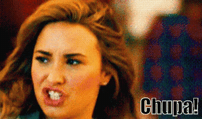 Woman Making Funny Face With Chupa GIF