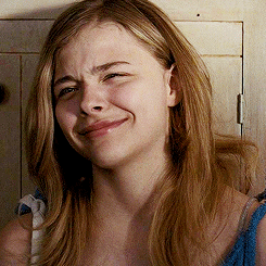 Woman Making Funny Face With Eyes Closed GIF