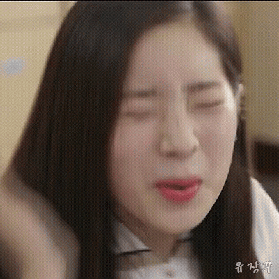 Woman Making Funny Face With Eyes Closed And Mouth Open GIF