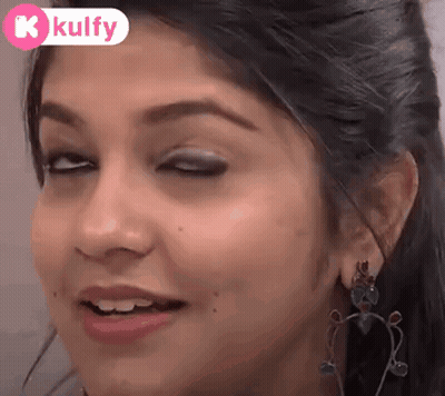 Woman Making Funny Face With Eyes Closed GIF