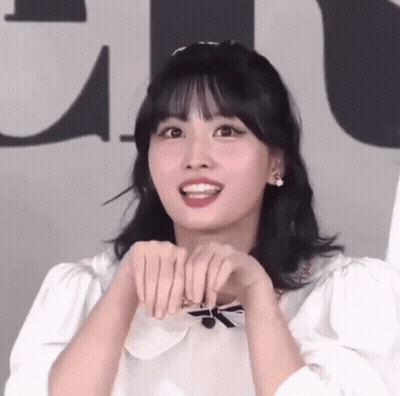 Woman Making Funny Face With Folded Hands GIF