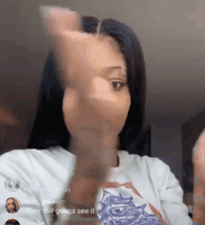 Woman Making Funny Face With Hand GIF