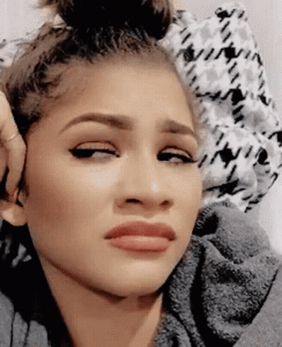 Woman Making Funny Face With Hand On Ear GIF