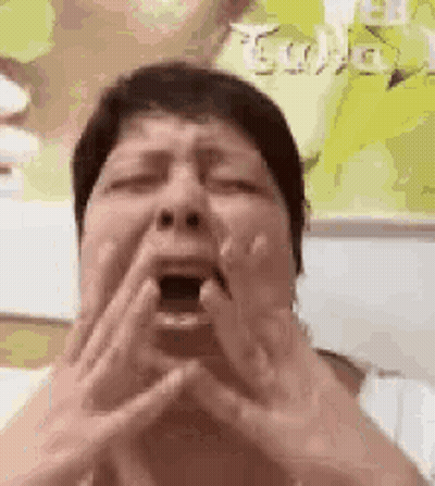 Woman Making Funny Face With Hands On Face GIF