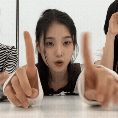 Woman Making Funny Face With Hands Outstretched GIF