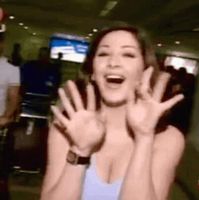 Woman Making Funny Face With Hands Up GIF