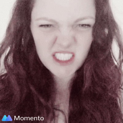 Woman Making Funny Face With Momento Logo GIF